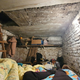 An image of an underground garage that a Ukrainian developer hid in with his family.